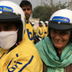 A woman passenger on a Baxi bike.